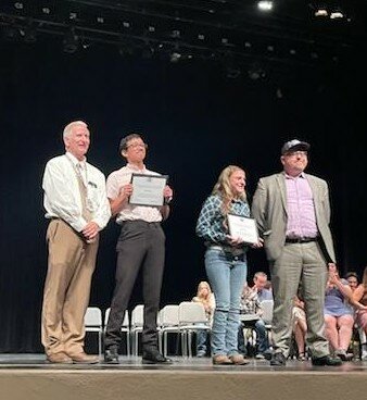 The awards were given out on May 6. From left are Randy Lazar, director of the Students Taking Accountability and Responsibility for Success program at Apache Junction High School; students Raul Torres and Rylee Bailey; and Jeffrey Mitchel, president of Kiwanis Club of Apache Junction.