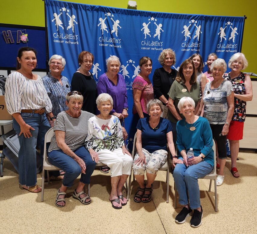 Members of the Four Peaks Women&rsquo;s Club recently volunteered to sort school supplies for the Children&rsquo;s Cancer Network. Pictured in back from left are Kaye Baumgartner, Bonnie Matty, Kathleen Saucer, Helen Quigley, Marcia Masur, Nancy Siebert, Kim Johnson, Cheryl Stark and Donna Herrman. In front from left are Ginny Trulson, Donna Yordy, Pat Willigrod and Sue Augir.