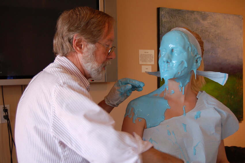 Gullwing created a secret formula he calls &ldquo;blue stuff&rdquo; that coats the model&rsquo;s face or body, capturing intricate details of the skin including texture and pores.