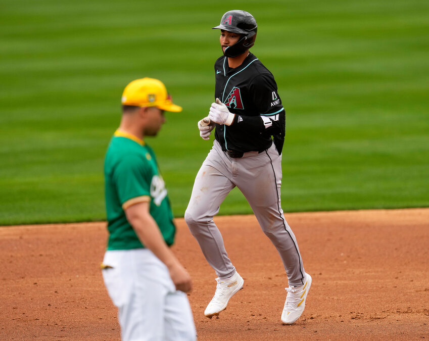 Diamondbacks' prospect Jordan Lawlar rounds the bases after hitting a solo home run against the A&rsquo;s during Spring Training in Mesa on Feb. 26, 2024.