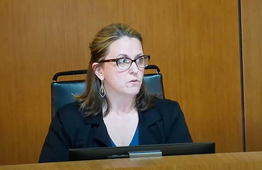 Chandler Planning and Zoning Commissioner Sherri Koshiol asks questions during the board’s Sept. 18 meeting. The commission advanced plans for a 420-unit apartment complex to be built on a North Arizona Avenue site soon to be vacated when Earnhardt Auto Centers moves its Chevrolet dealership to Queen Creek.