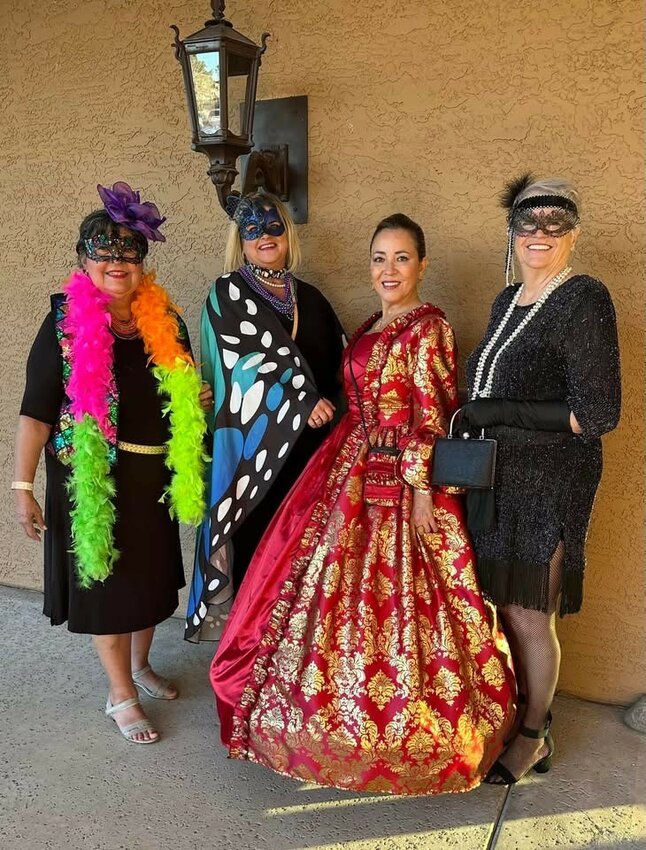 Members of Fountain Hills Sister Cities joined the German American Karneval Society in Peoria, Ariz., for its annual Karneval Gala. Pictured from left are Ruby Moreno, Tania Brown, Marisol Miller and Christine Colley. The German Karneval season begins Nov. 11, at 11:11 a.m. and ends on Fat Tuesday,  March 4, 2025. The Karneval highlights in Germany are the Rose Monday parades popular in Mainz, Cologne and Duesseldorf. The season is celebrated throughout the world including Mardi Gras in the U.S. and Carnival in Brazil and Italy. Elaborate, colorful costumes are popular during the season throughout these celebrations.