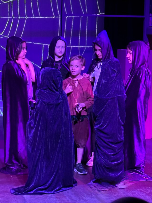 The cast of &ldquo;The Neverending Story&rdquo; work on lines during a recent rehearsal at the Actors PLAYground.