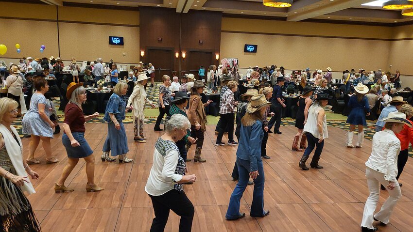 Enthusiastic guests filled the dance floor at the &ldquo;Boots and Bangles&rdquo; celebration.