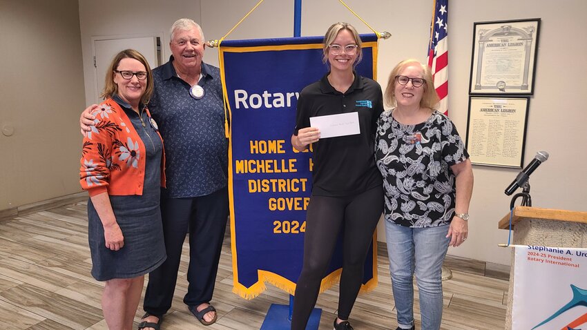 The Rotary Club of Fountain Hills recently donated money to the Extended Hands Food Bank. Pictured from left, Treasurer Cheryl Gollon, Sergeant at Arms John Dow, Food Bank Assistant and Operations Director Allyson Iverson and Club President Michelle Holtzman.