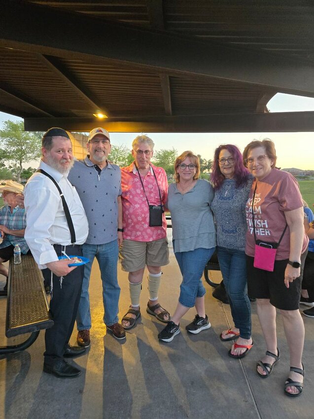 Pictured from left, Rabbi Mendy Lipskier, Jack Bender, James Nayhouse, Jody Freed, Shari Bender and Diane Nayhouse celebrate Lag Ba&rsquo;Omer at Fountain Park.