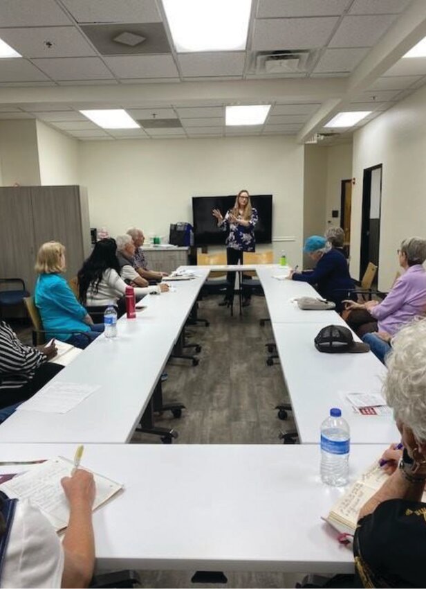 Community members engage in a Benevilla workshop focused on senior wellness and education.