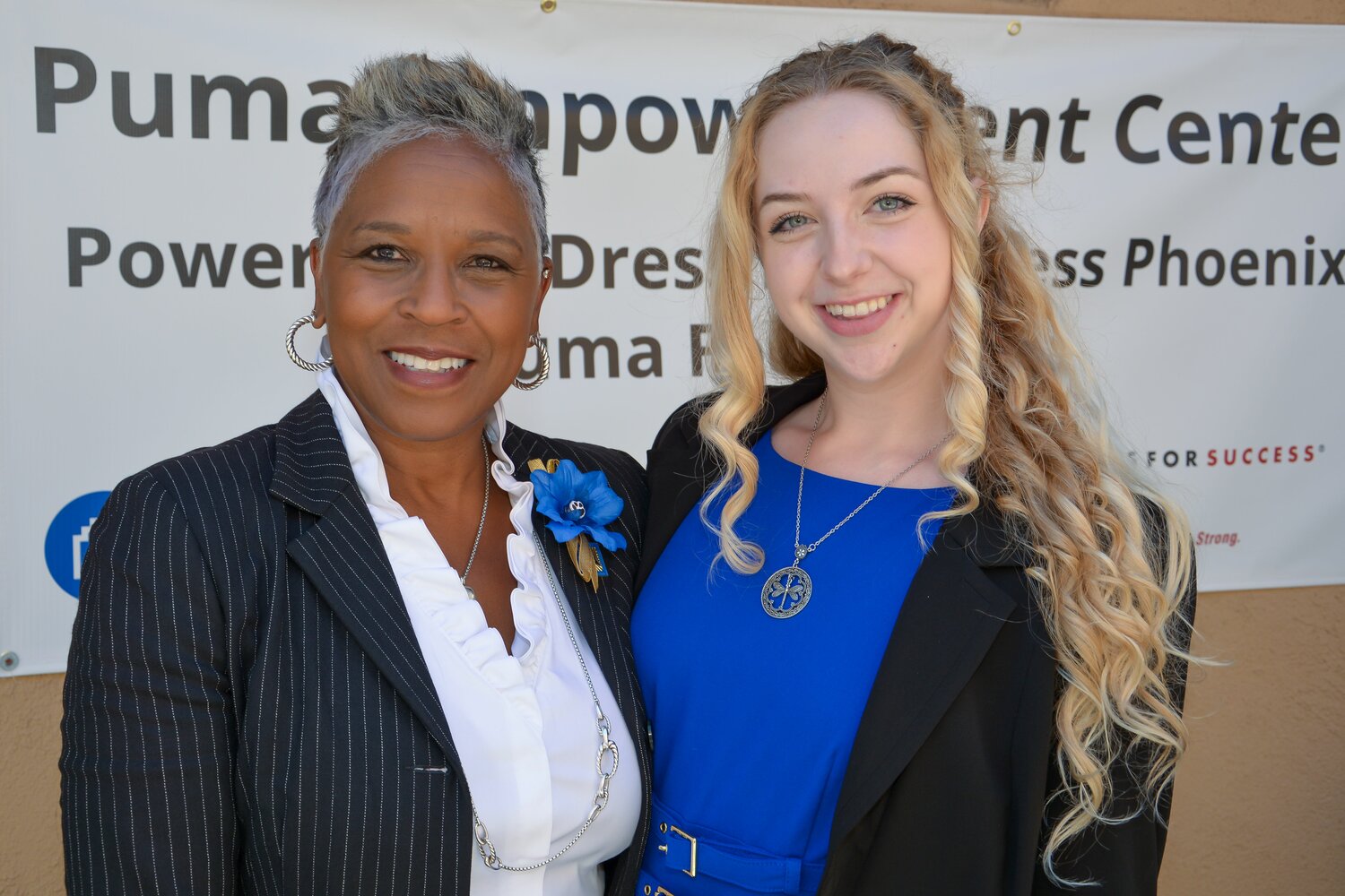 Dress for Success Phoenix CEO, Tamala McBath and the first student to be suited attend the soft launch ceremony.