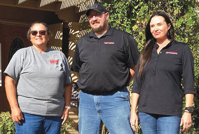 Pictured is U.S. Navy veteran Cheryl Reuss, 2022 Military Hero AC Giveaway winner, left, with Forrest Anderson’s operations manager, Dave Veatch, center, and Forrest Anderson President Audrey Monell.