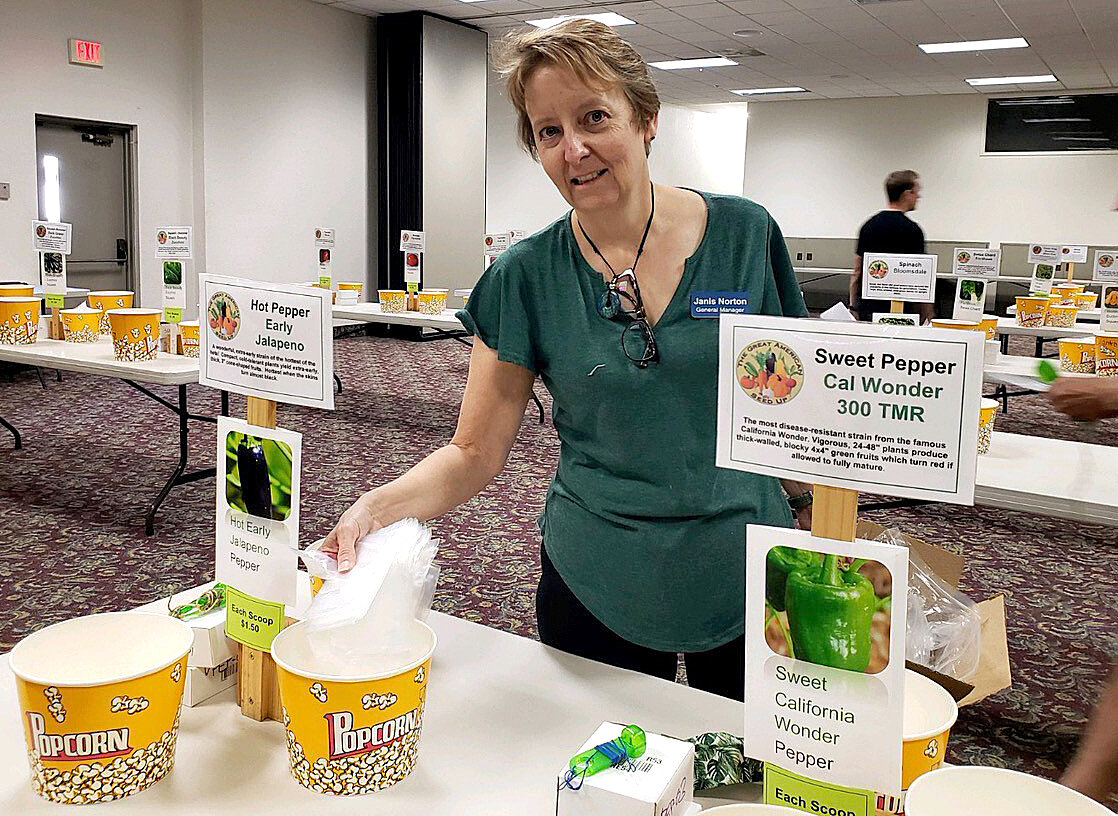 The event showcases a seed bazaar stocked with generous quantities of open-pollinated, non-GMO vegetable, wildflower, flower, grain, and herb seed varieties.