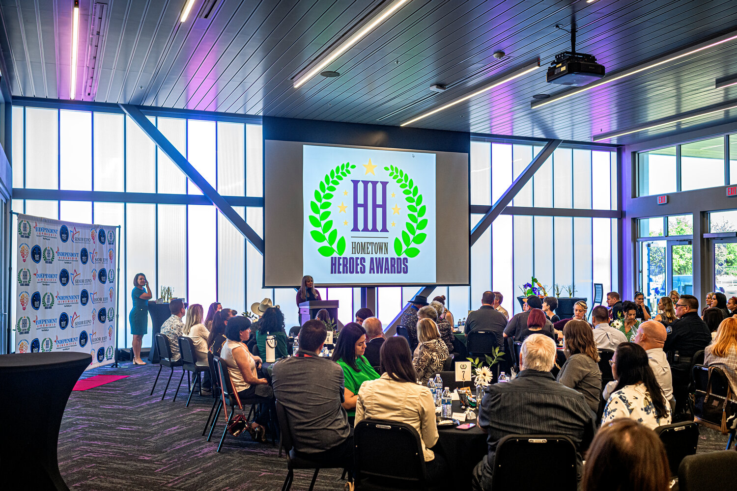 Attendees watch the award ceremony for the 2023 Hometown Heroes Awards of Queen Creek Luncheon at the Queen Creek Performing Arts Center on Wednesday, October 18, 2023. Tickets are now available for the Peoria Hometown Heroes luncheon, Feb. 20.