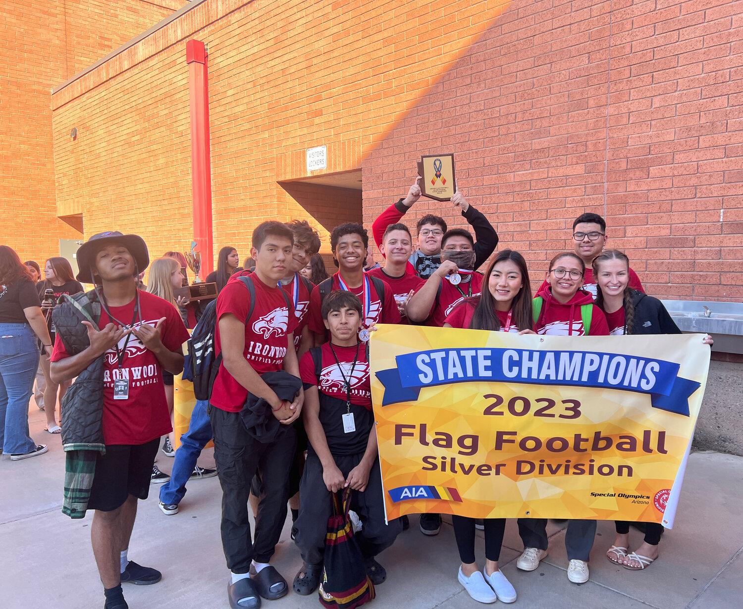 The Ironwood High School Unified Sports flag football team celebrates winning the state Silver Division title in Late October on Ironwood's Glendale campus.