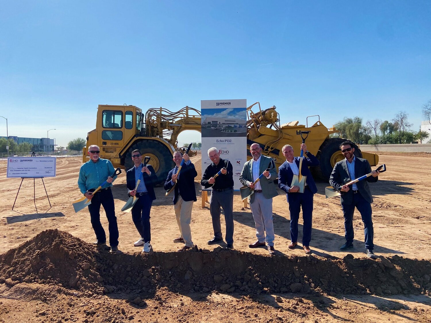 Surprise Mayor Skip Hall, center, was among the group that put shovels in the ground at an official ceremony Nov. 2 for the ECHO P132 industrial complex at 132nd and Peoria avenues.