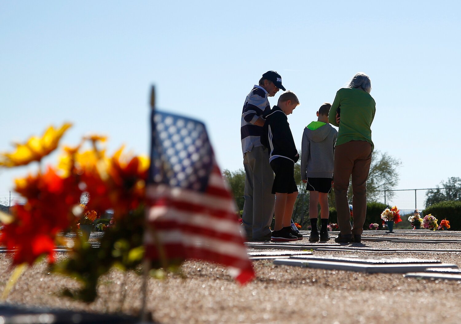 Visitors pay their respects at the National Memorial Cemetery of Arizona in Phoenix in this 2018 file photo.