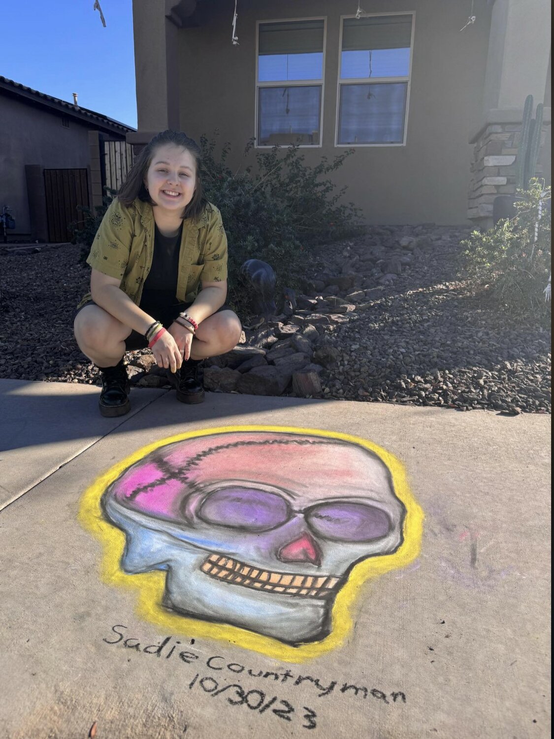 Sadie Countryman won the 13-to-17-year-old age group for her drawing of a skull.