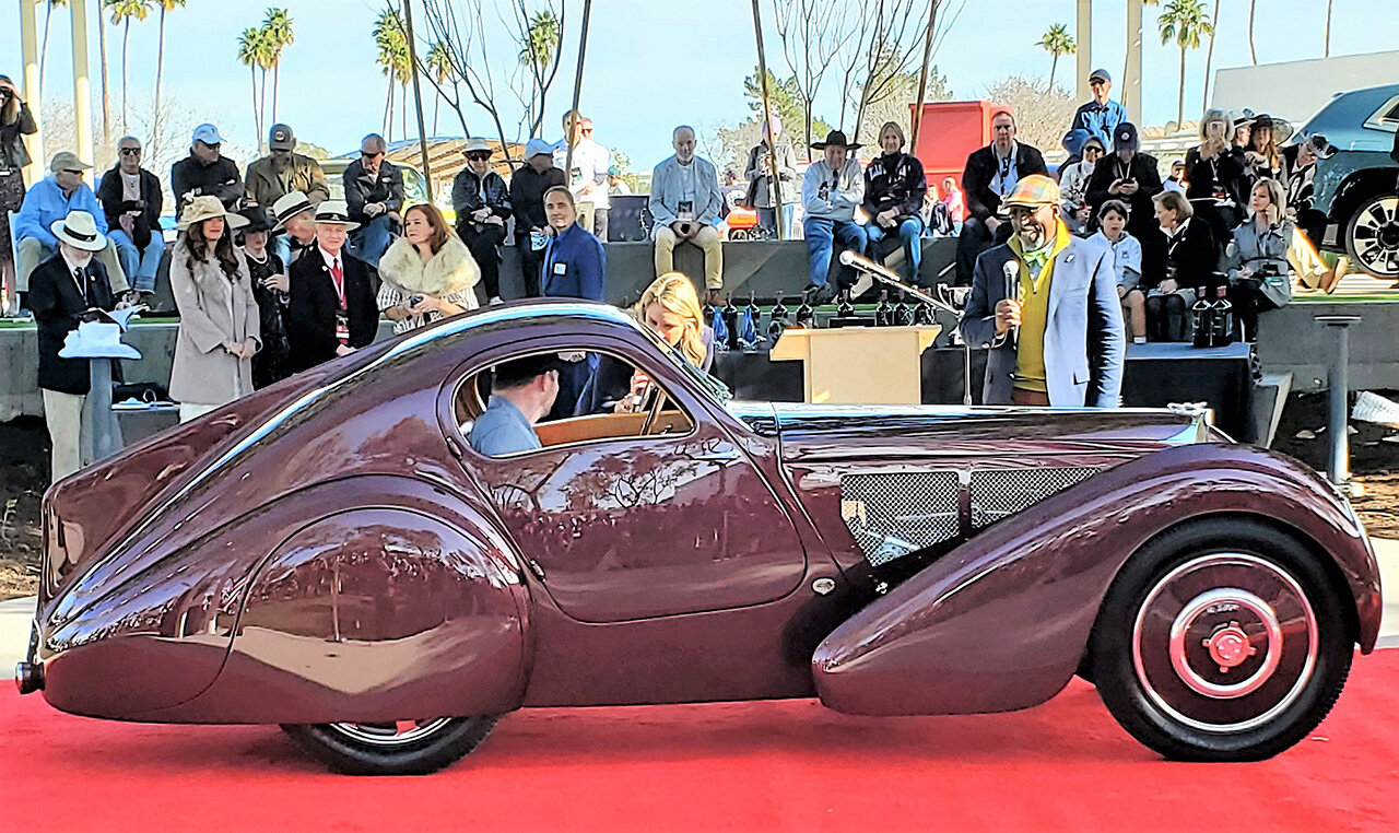 A 1931 Bugatti Type 51 Dubos coupe rolls across the 360 Stage at Scottsdale Civic Center during the 2023 Arizona Concours d’Elegance.