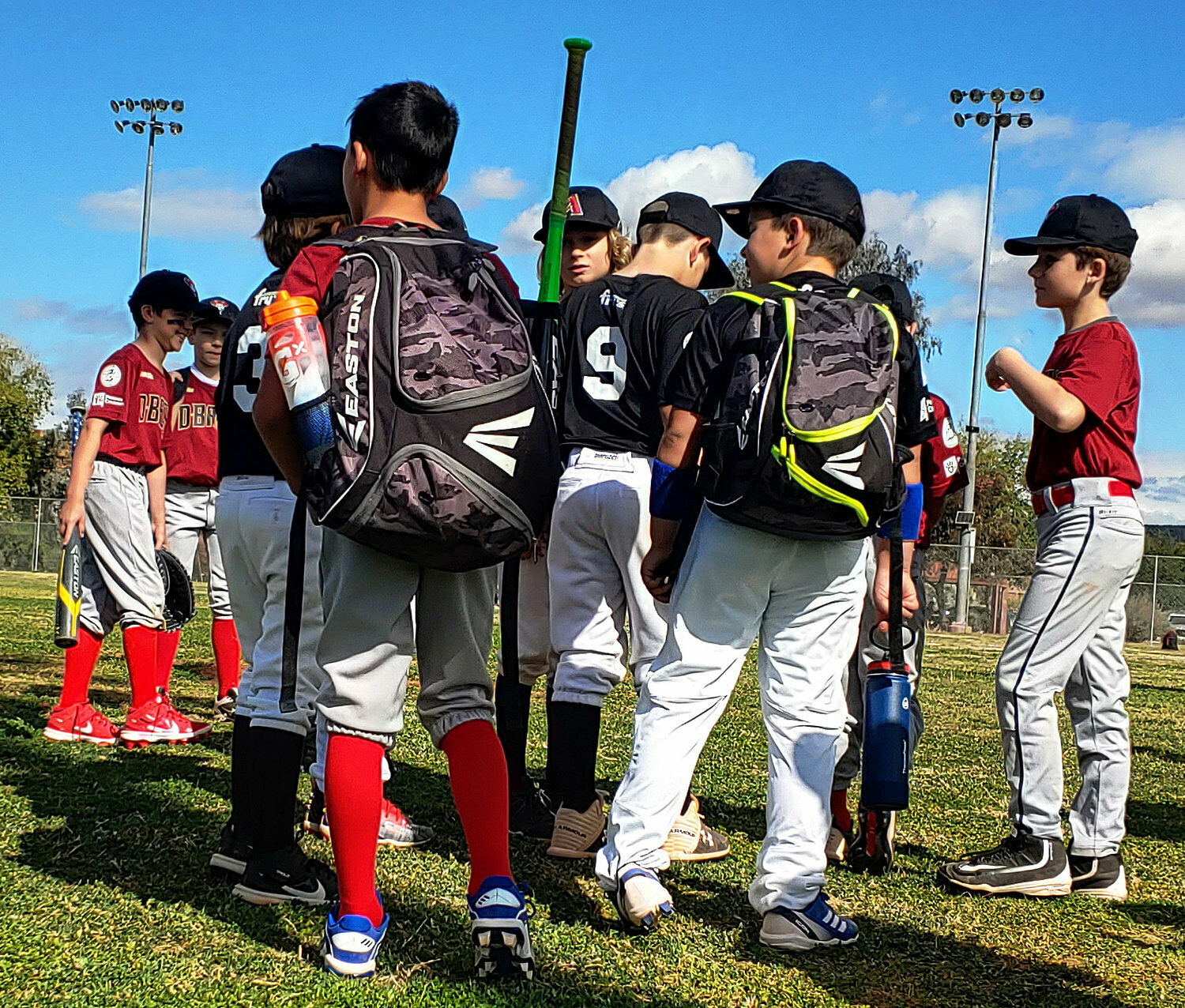 Players gather during a past Arrowhead Little League spring season opening day in Glendale.