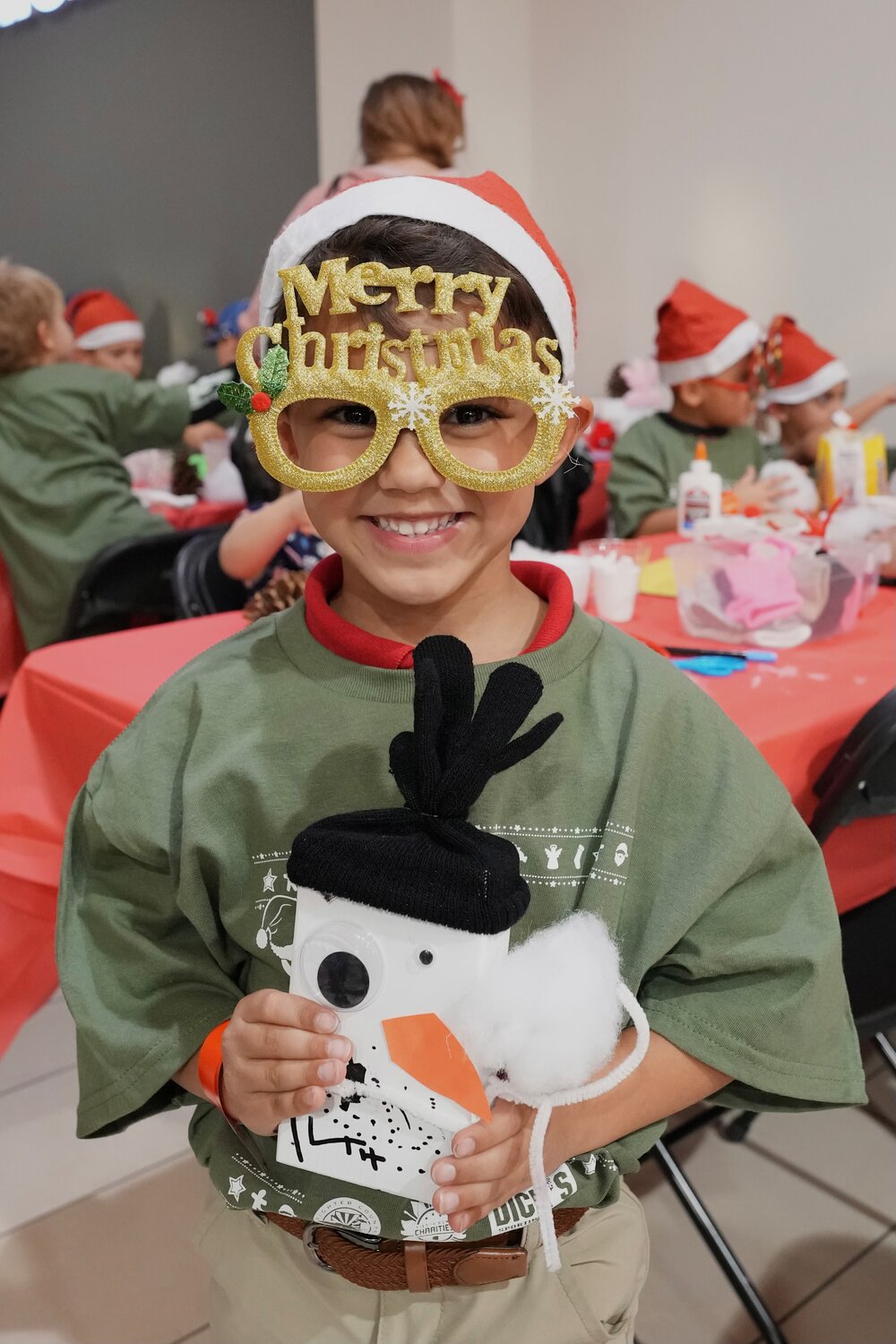 The son of an active, deployed parent from Luke Air Force Base enjoys the Operation Santa event  and shopping spree Dec. 7 at Dick's Sporting Goods at Arrowhead Towne Center in Glendale.