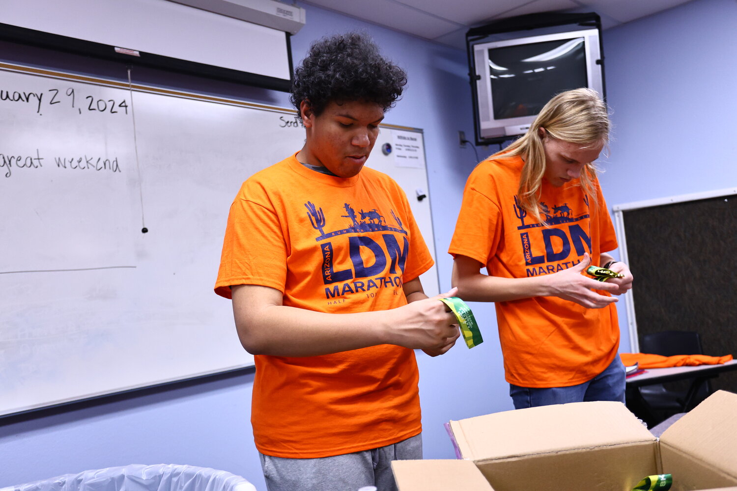 This year, as in previous years, the students took on the responsibility of unpacking medals for the Lost Dutchman Marathon scheduled for Feb. 18.