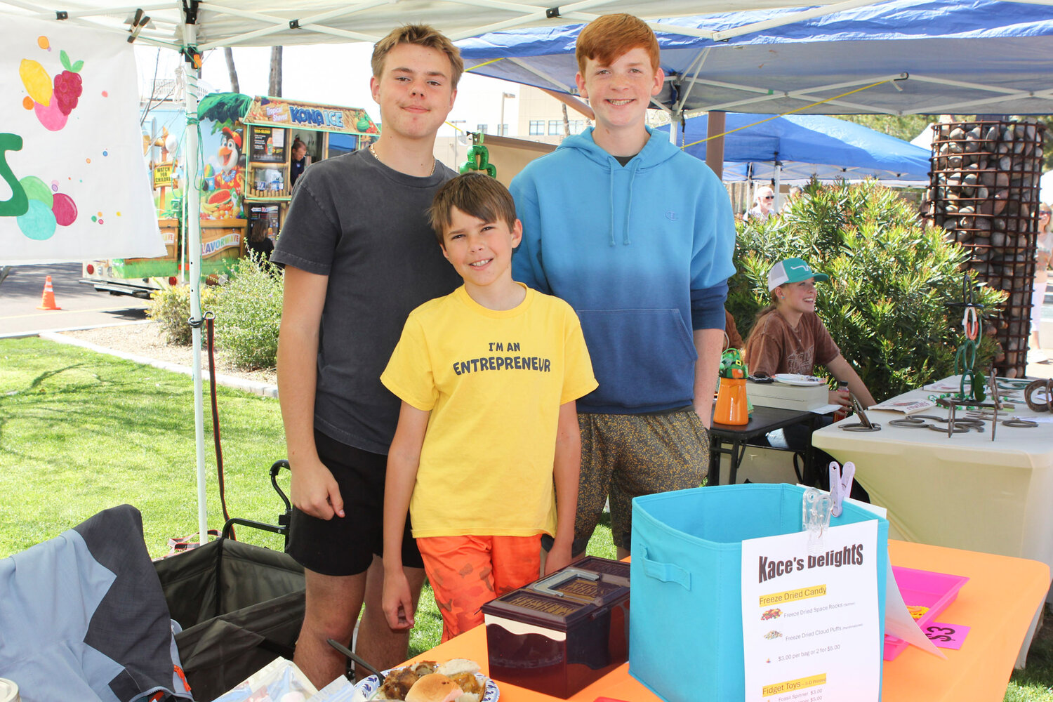 Keith Lehnen (center), who offers freeze-dried candy and 3D-printed fidget spinners, enlisted the help of his brother Knox Lehnen (left), who runs Case Delights, and his friend Kasen Broker (right).