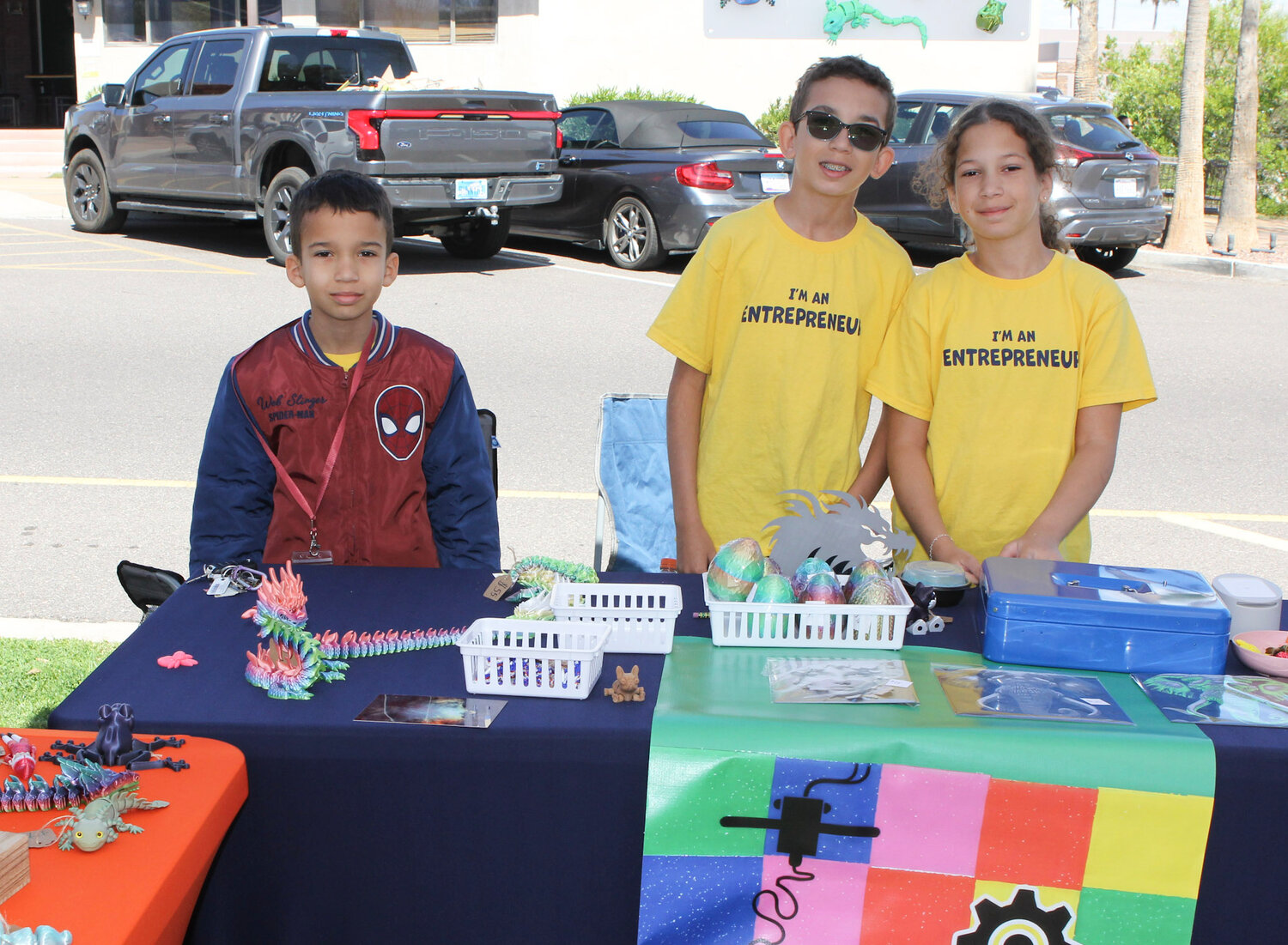 Brothers Parker, Aiden and Mareia Easterwood, from left, sell 3D printed magnets, pencil holders, phone holders and more. The brothers sell their unique products online at 3deepdesign.net.