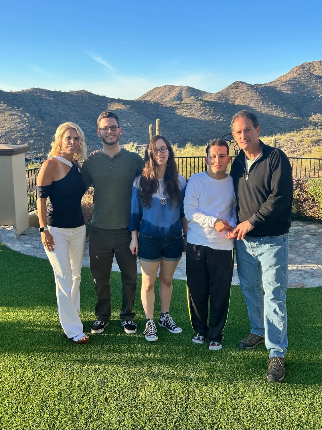 Wendi and Howard Sobelman with their triplets.